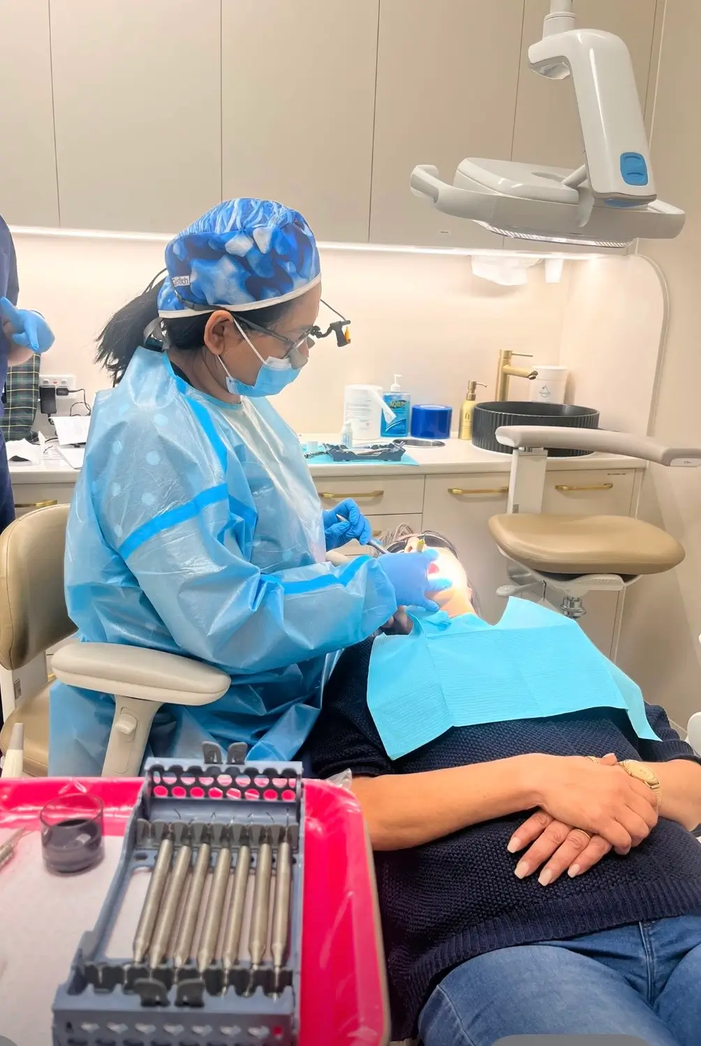 Dentist performing dental treatment on a patient